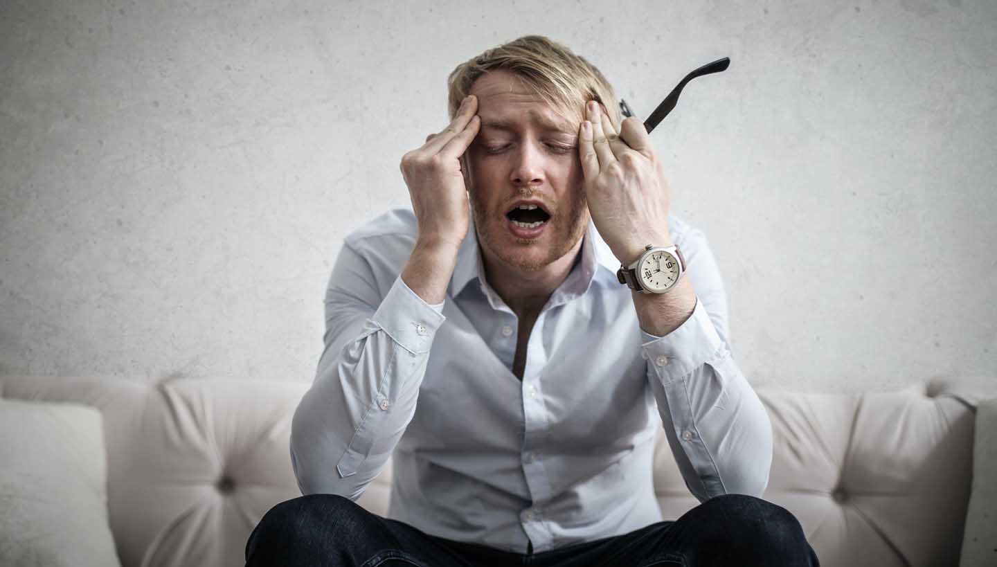 Tension headaches can be caused by stress-induced insomnia / Photo by Andrea Piacquadio from Pexels