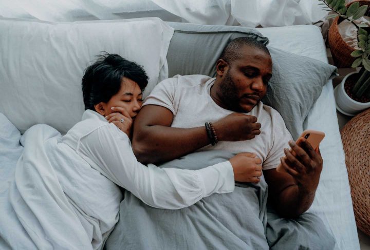 Man using cellphone in bed - Photo by Ketut Subiyanto from Pexels