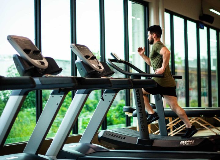 A man exercising on a treadmill - Photo by William Choquette from Pexels